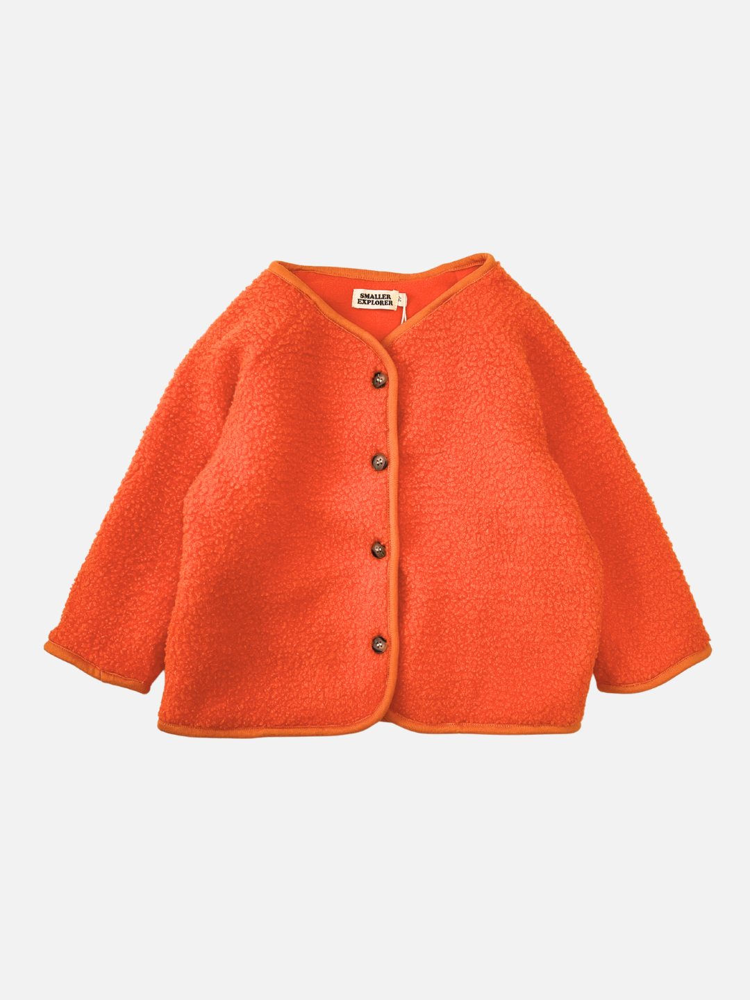 Tangerine | Front view of a kids orange collarless fleece jacket with four brown buttons.