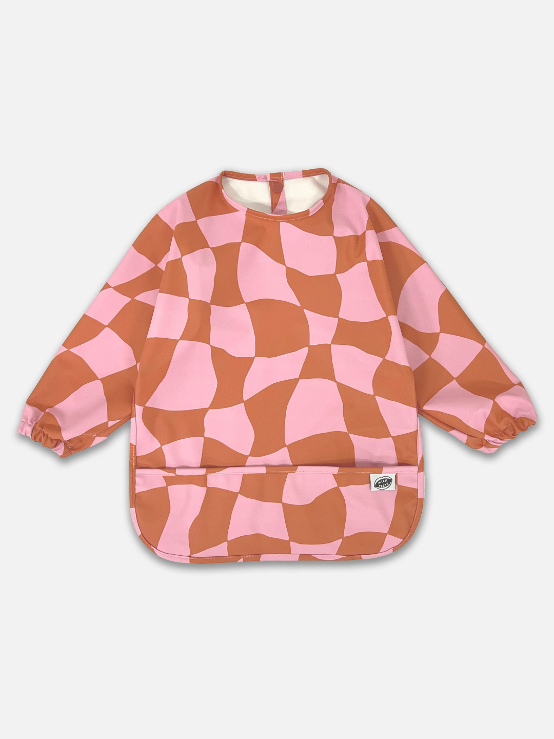 A front view of the long sleeve light pink and rust wavy checked bib with a front pocket.