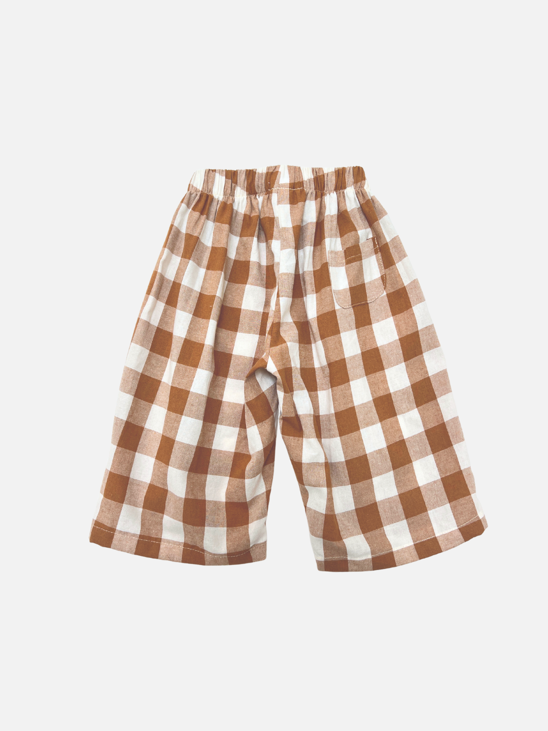 Brown + White | GINGHAM BABY PANTS in brown and white cotton with an elastic waistband, displayed flat on a white background. Ideal for trendy Korean baby outfits.