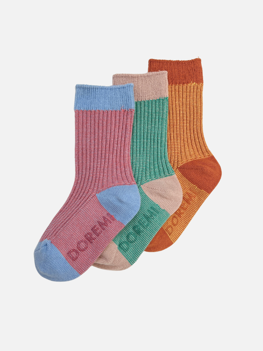 Three pairs of colorful ribbed socks from the Korean brand, Doremi — the TRIO SOCK SET: pink and blue, green and beige, and orange and brown — arranged side by side.