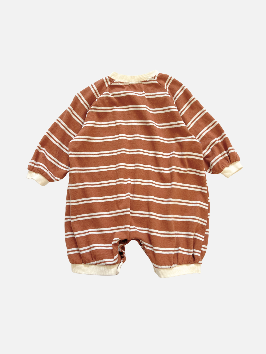 Terracotta | The SLOUCHY STRIPE ROMPER is a brown and white striped, long-sleeve baby romper made from soft cotton jersey with cream cuffs, shown flat on a white background. From a cozy Korean baby brand.