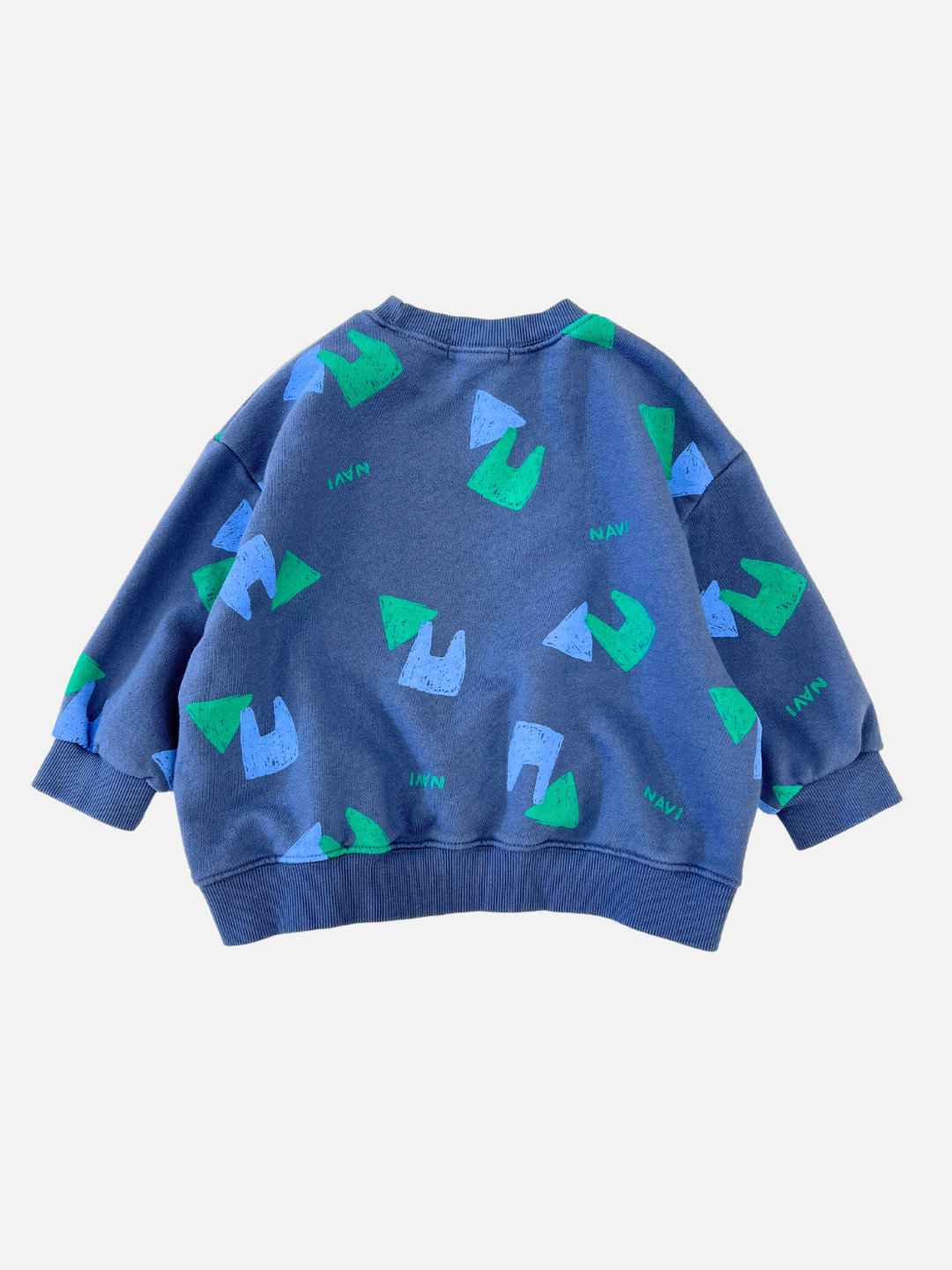 Back view of kids blue crewneck sweatshirt with an all over pattern of green and blue shapes and the brand name Navi.