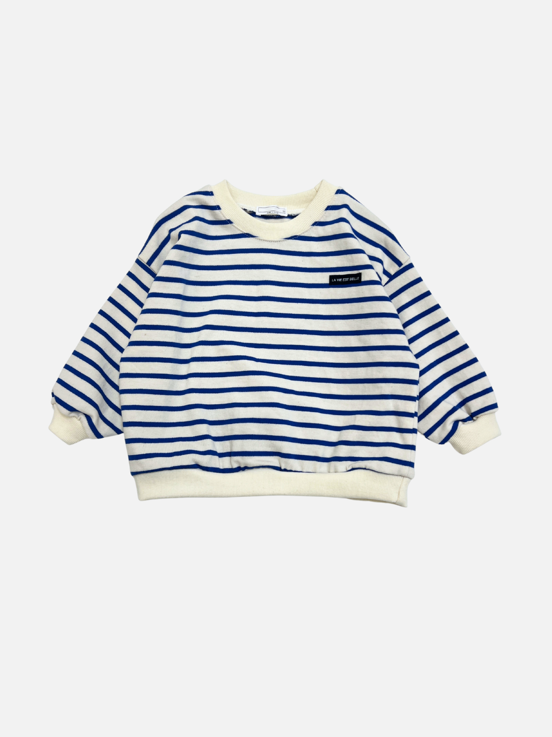 Blue | The BRETON BABY SWEATSHIRT features blue and white horizontal stripes, long sleeves, a crewneck, and cream-colored cuffs, hem, and collar. A subtle black label on the left chest adds a modern touch.