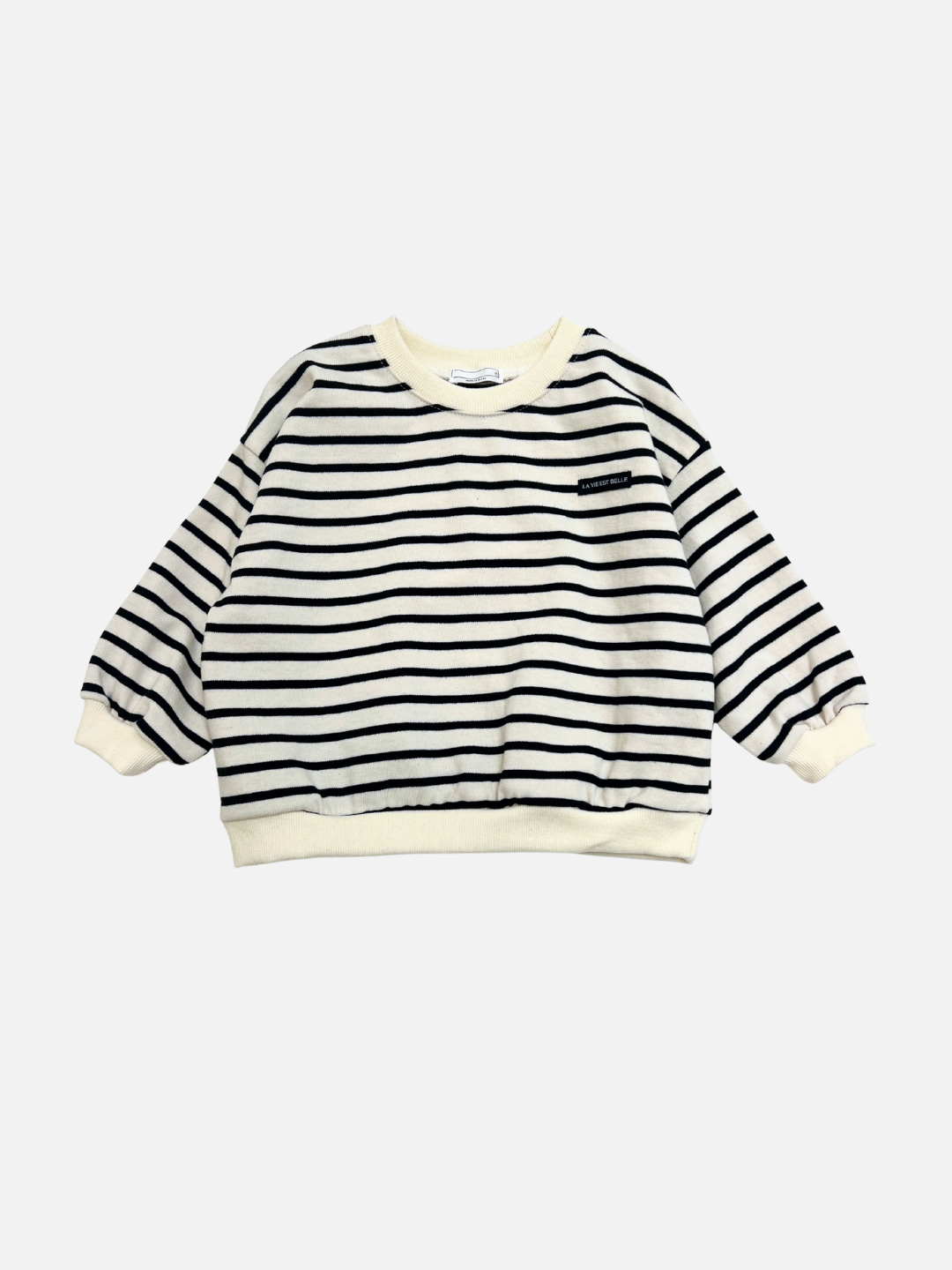 Black | The BRETON BABY SWEATSHIRT features black and cream stripes, long sleeves, and cream-colored cuffs, hem, and collar. It is displayed on a minimal white background.