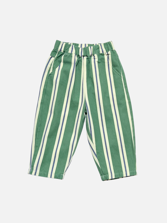Image of Green and white vertically striped kids trousers with an elastic waistband, shown flat on a light gray background.