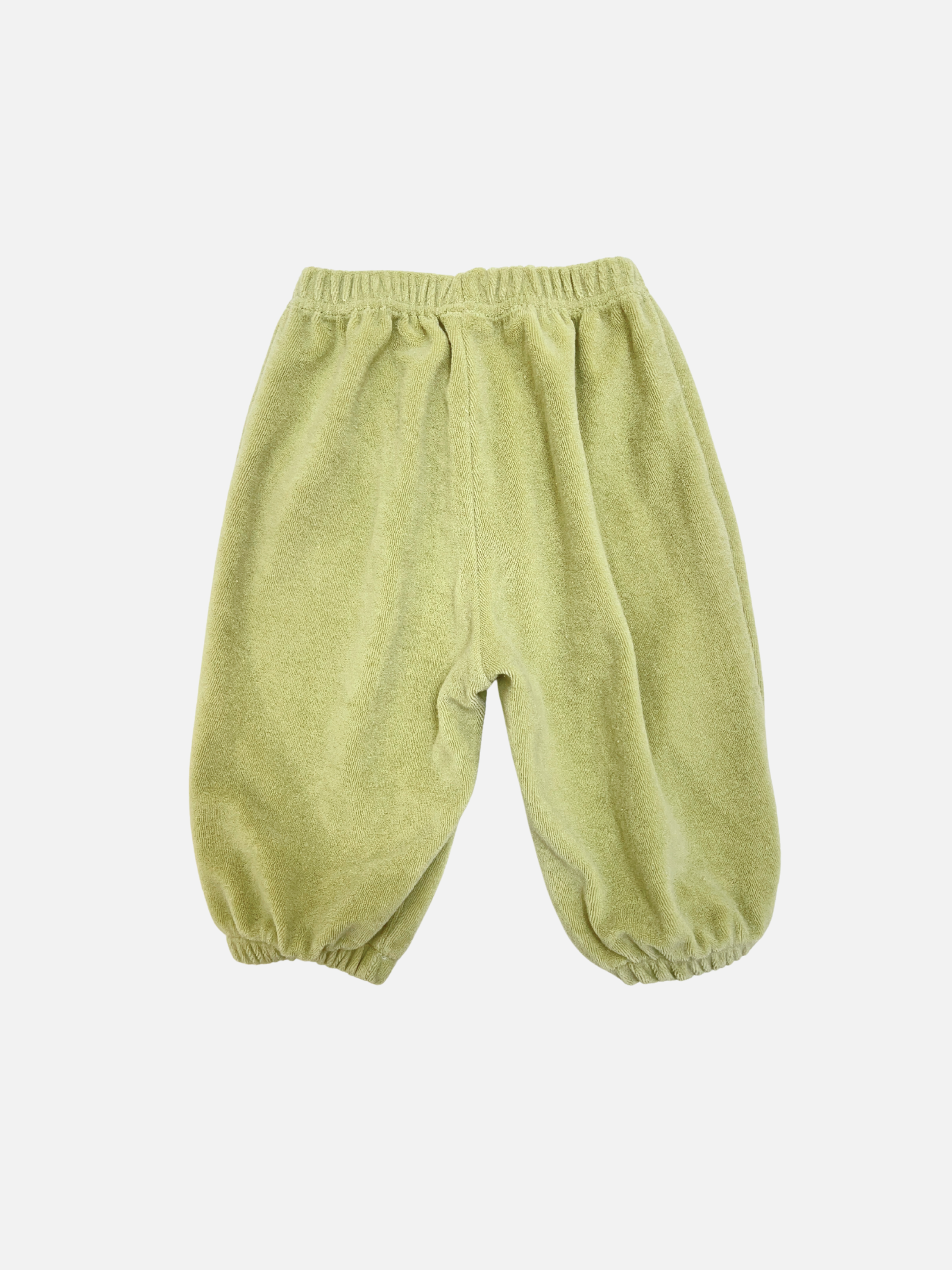 BABY TERRY JOGGER: Light green cotton terry jogger pants with elastic waistband and cuffs from a popular Korean baby brand, shown on a plain white background.