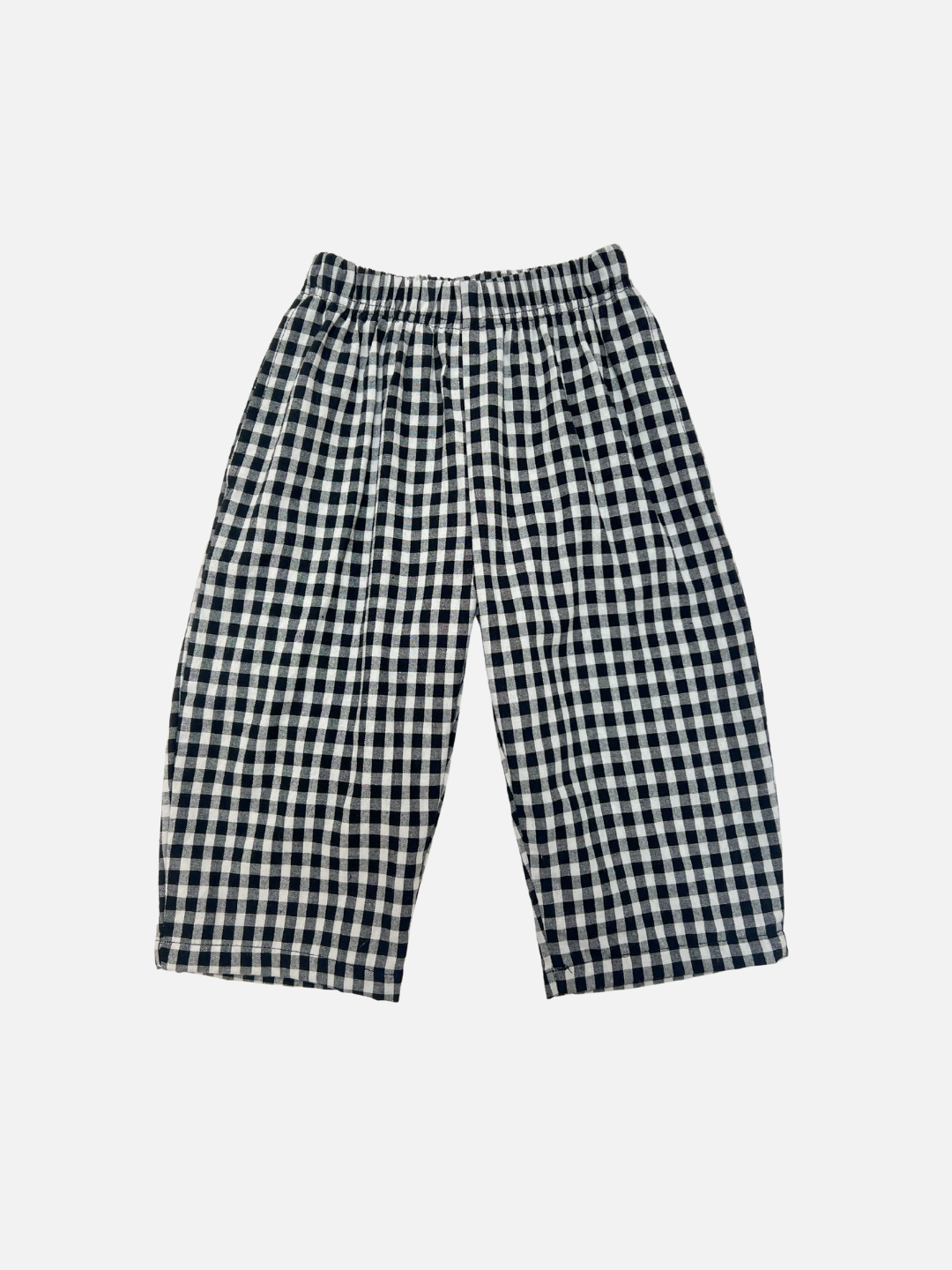 Front view of kids black and off-white gingham check pants.