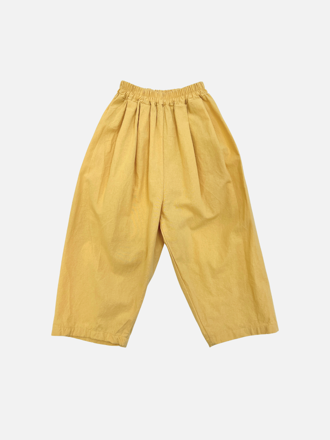 The GARDEN COTTON PANT in yellow features a wide-leg design and elastic waistband, made from lightweight fabric for all-day comfort, shown against a plain white background.