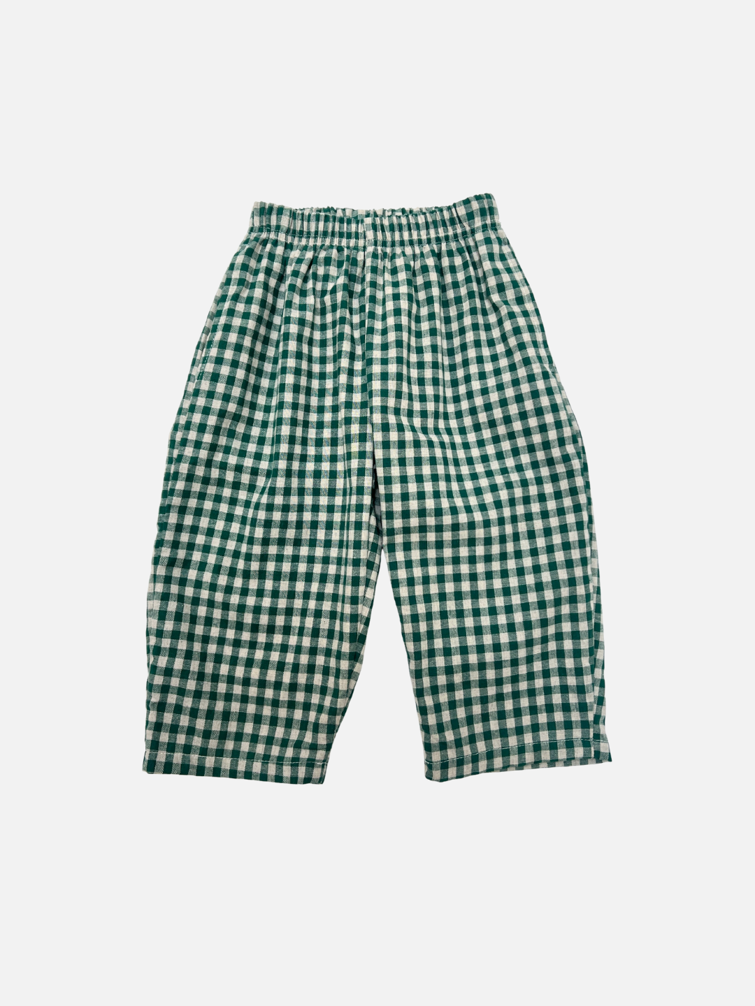 Green and white checkered pants on a light gray background