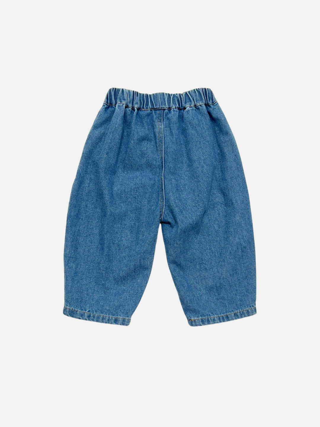 Blue | Back view of a pair of toddler's wide-leg denim pants with an elastic waistband, shown flat against a light gray background.