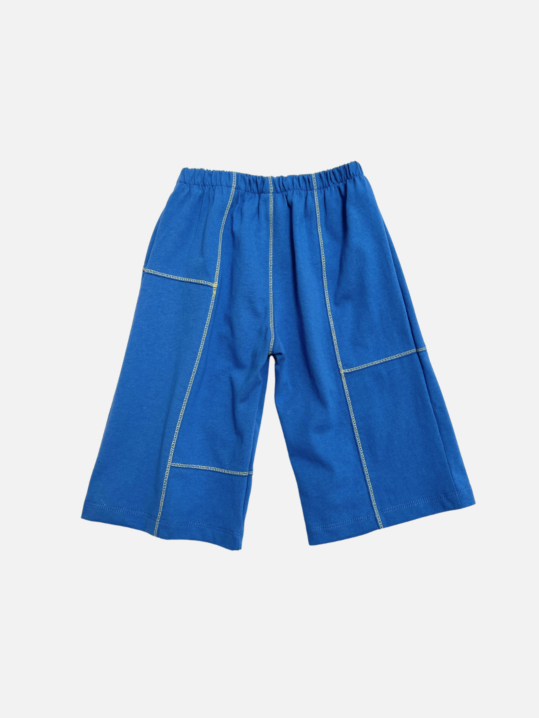 The TOPSTITCH BABY PANT features blue fabric, an elasticated waist, and visible yellow stitching. These durable children's crawling pants are displayed against a plain white background.