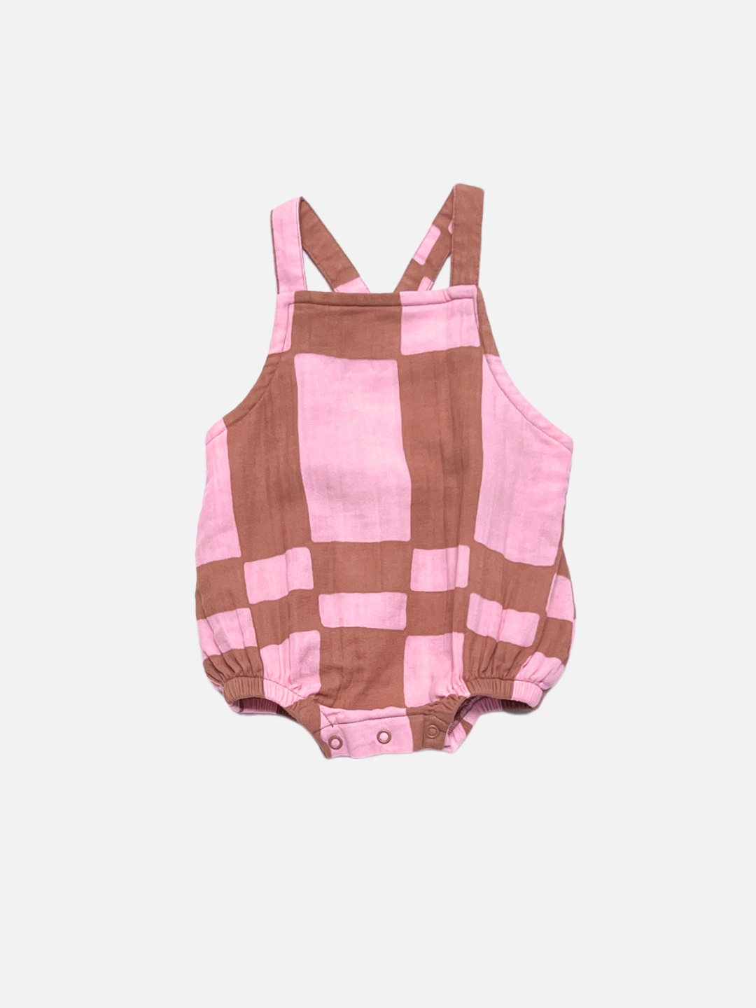 Pink and brown checkered romper on a white background