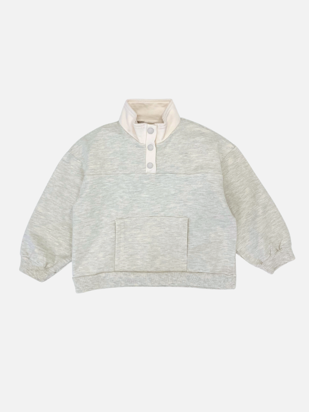 The EVERYDAY PULLOVER is a heather grey long-sleeve sweatshirt featuring a front pocket, three white buttons on a high funnel neck collar, and elastic cuffs, displayed against a white background.