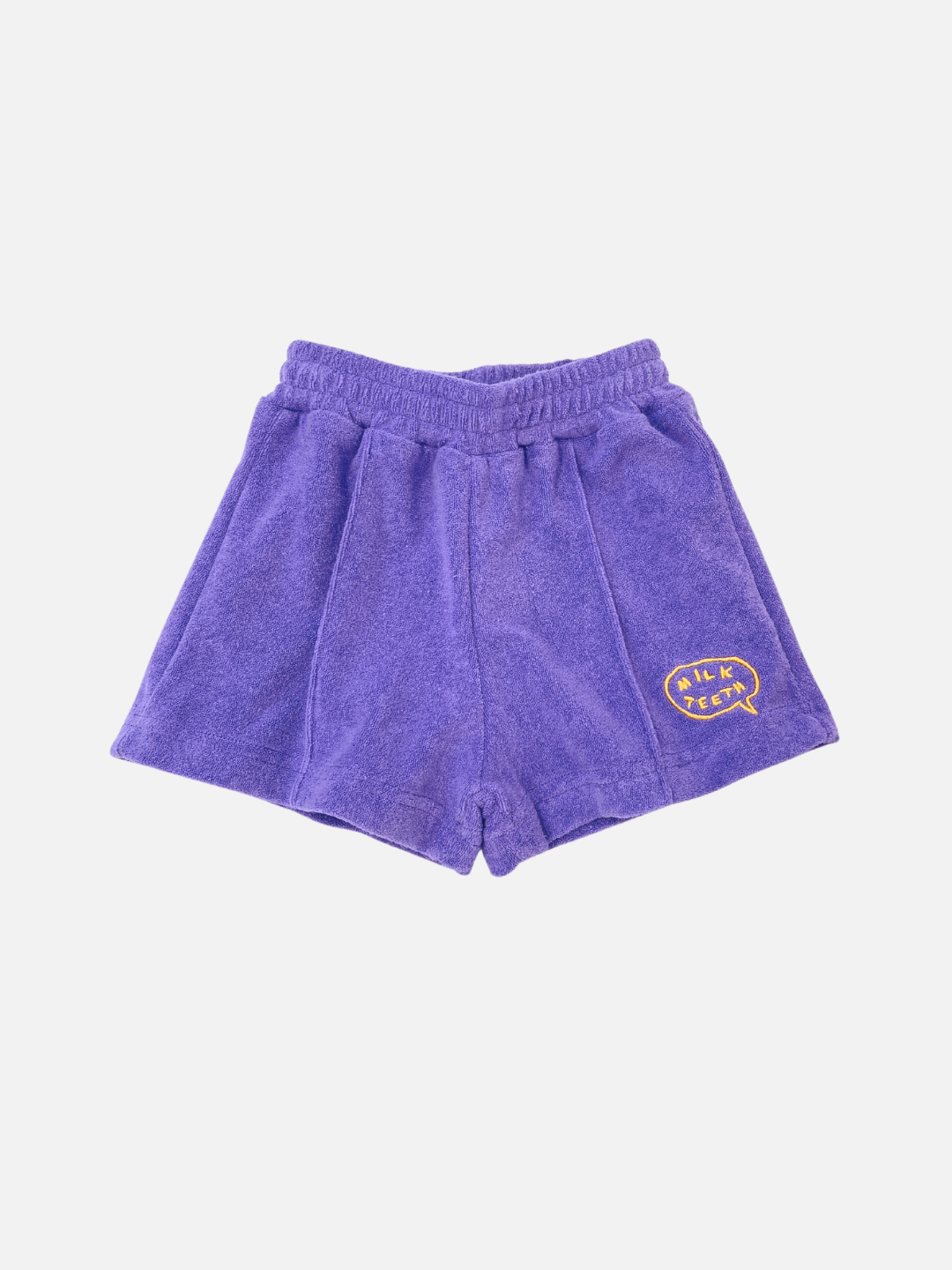 EVERYDAY TERRY SHORTS in purple cotton terry with an elasticated waist and a yellow embroidered heart-shaped "TIK TOK" patch.