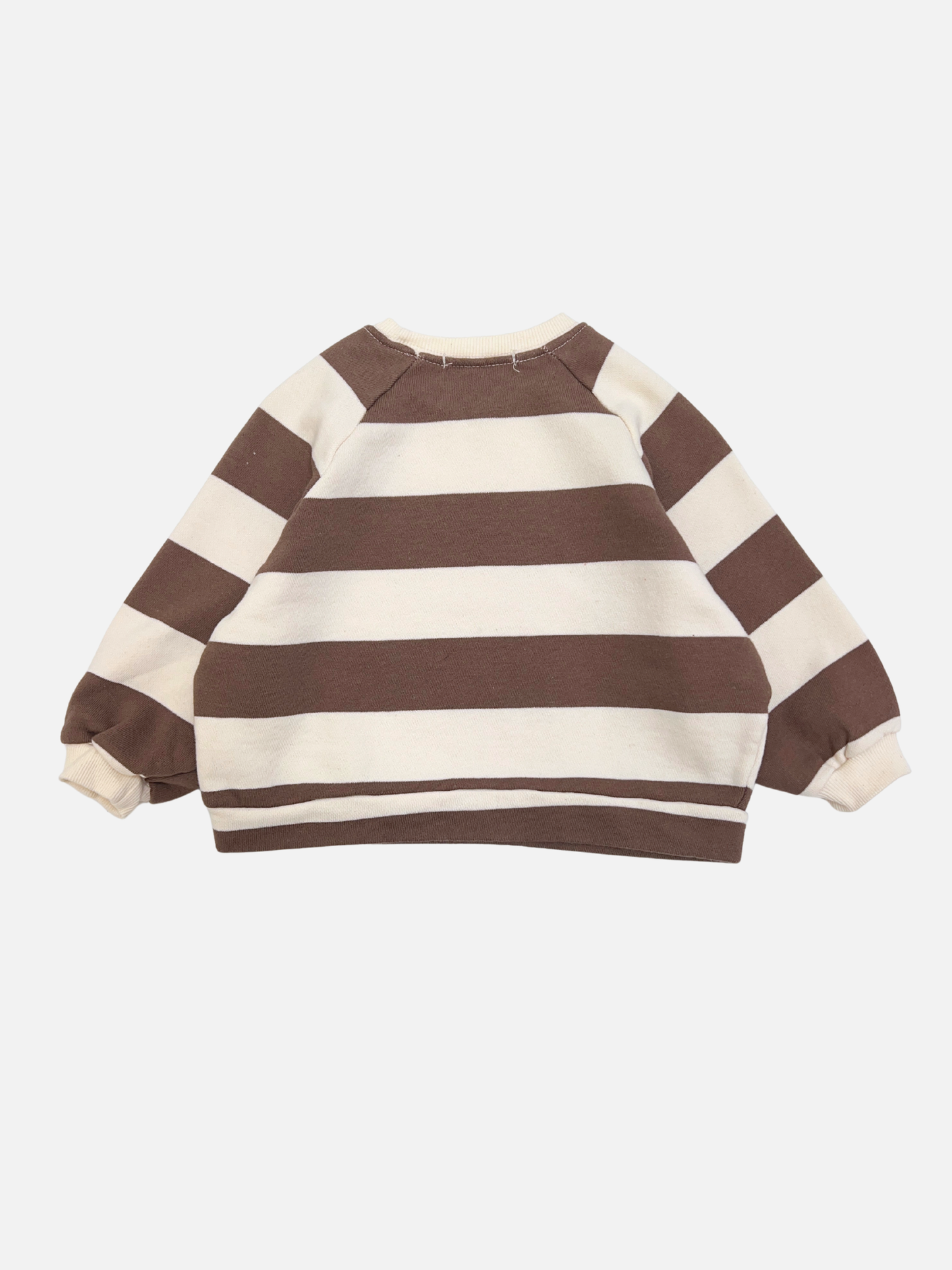 Mocha | The STRIPE BABY SWEATSHIRT is a cotton terry, long-sleeve baby top from a Korean brand, featuring wide horizontal brown and white stripes, displayed flat with the back side up.