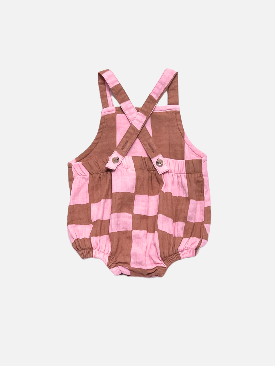 Pink Checkers | Back view of pink and brown checkered romper on a white background, showing the straps crossed in back.