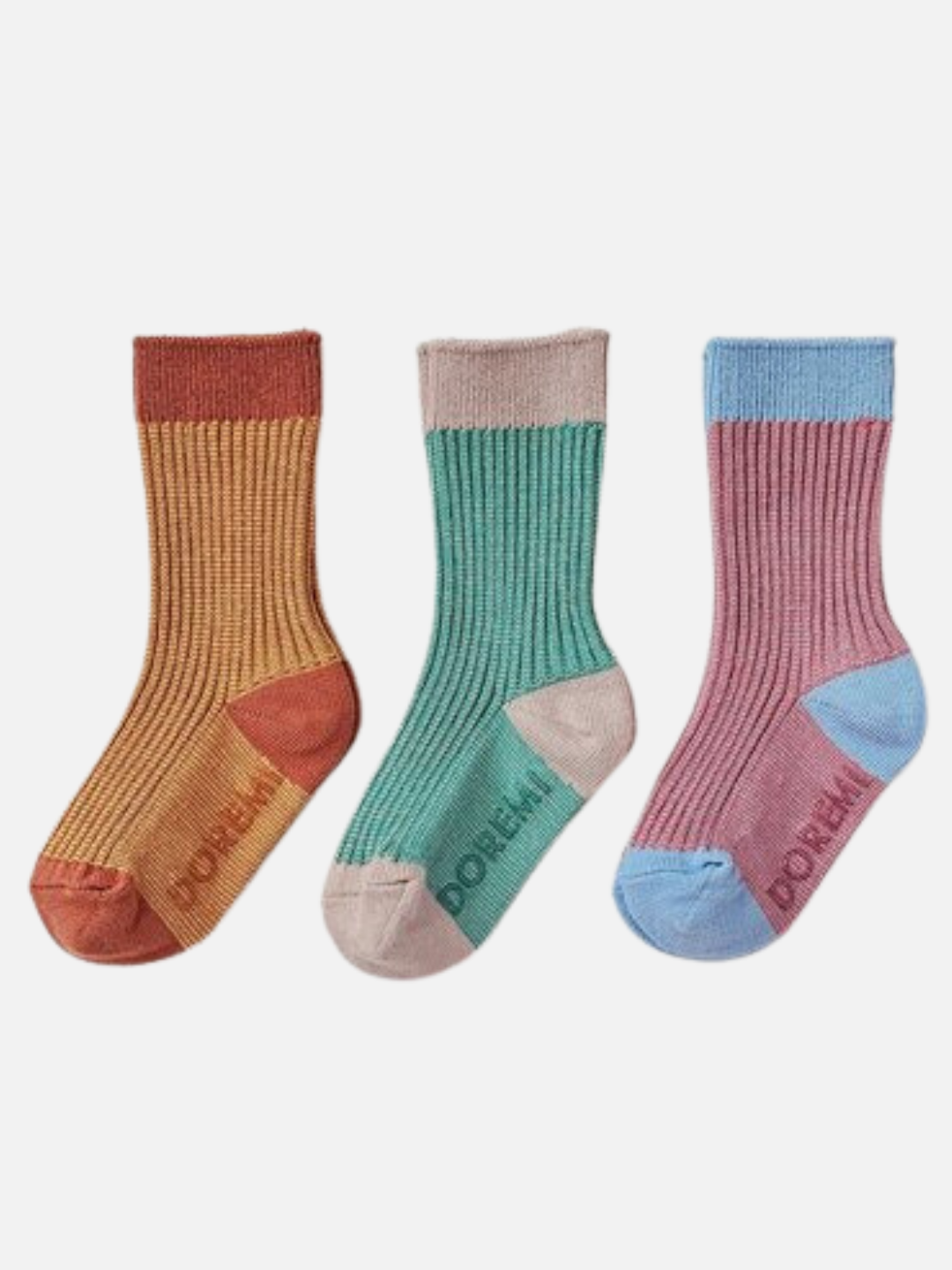 The TRIO SOCK SET includes three pairs of colorful ribbed socks in unique combinations: orange and tan, green and beige, and pink and blue. Each pair of these Korean brand socks features the word "DOREMI" on the sole.