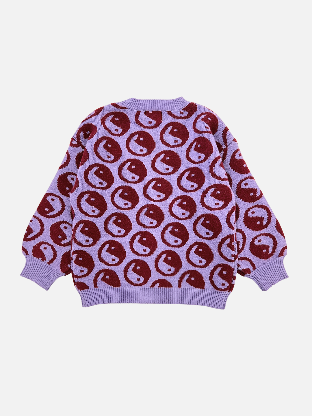 Violet | The COSMOS SWEATER is a super-soft, intarsia knit crewneck featuring an all-over pattern of circular designs in purple and red.