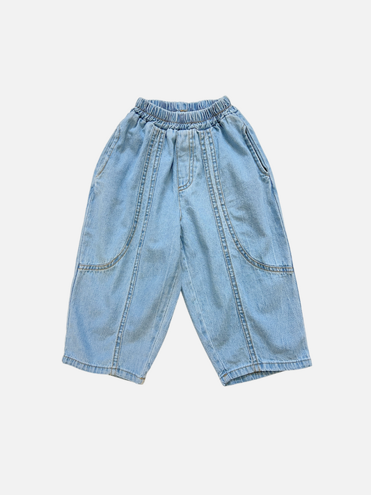 Image of MIYU JEANS: Light blue baggy jeans made from lightweight denim with an elasticated waist and wide legs, shown flat on a white background.