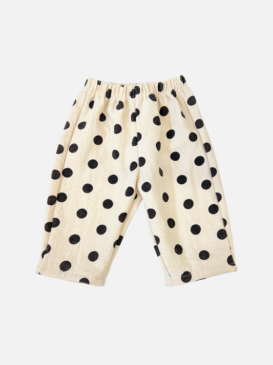 Image of Ecru pull-on cotton pants with black polka dots, designed by a renowned Korean baby brand, POLKA DOT PANTS.