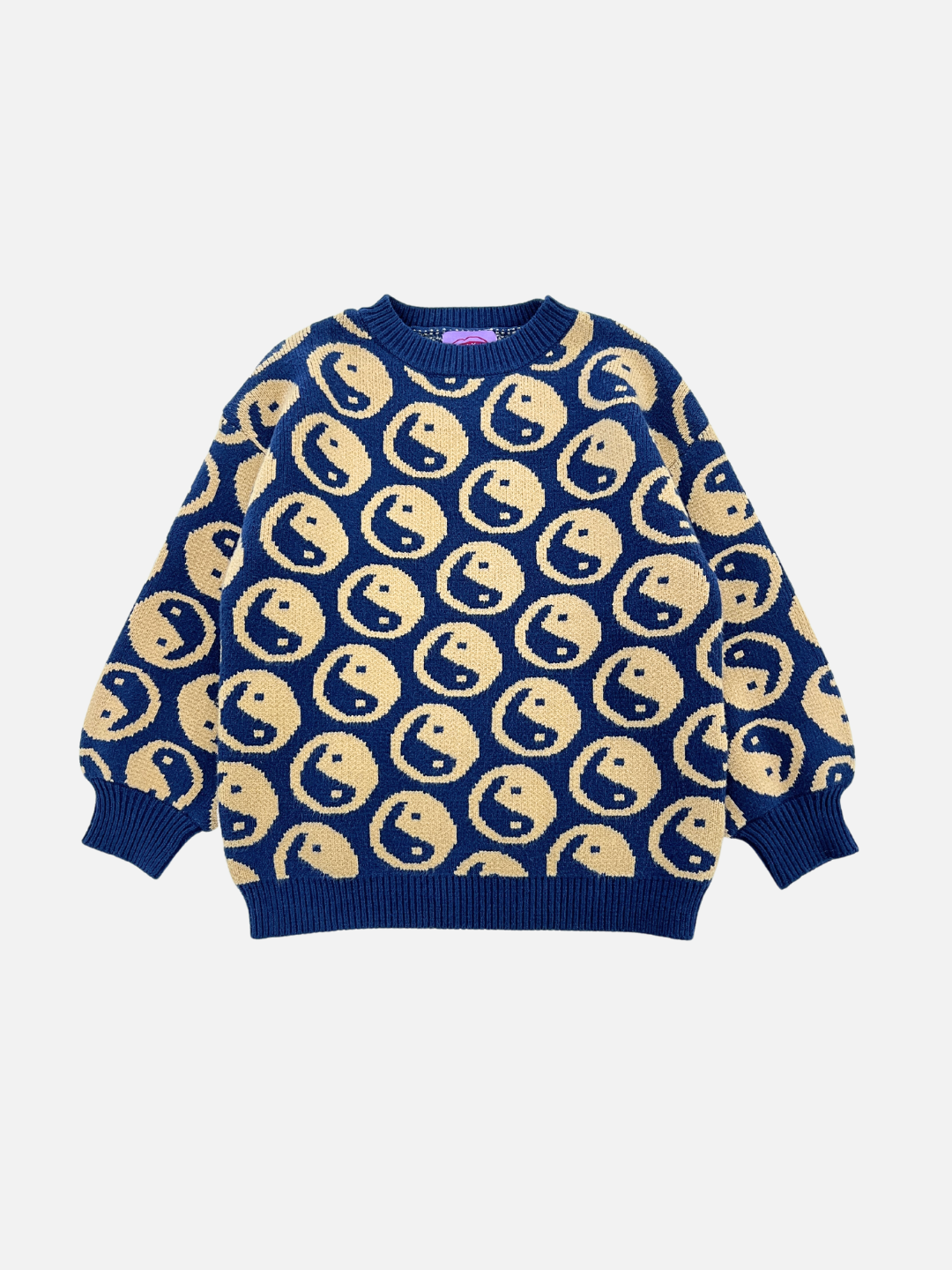 Navy | The COSMOS SWEATER is an ultra-soft dark blue crewneck adorned with cream-colored yin yang patterns throughout, highlighted by an intarsia knit design.