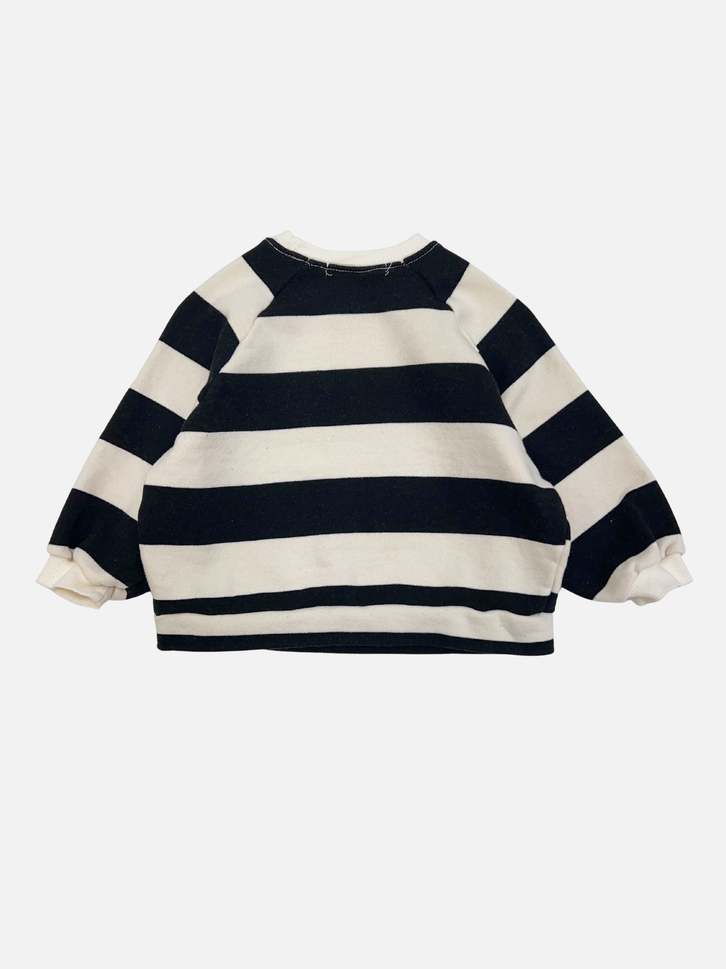 Black | The STRIPE BABY SWEATSHIRT is a soft cotton terry long-sleeve baby sweatshirt with black and white horizontal stripes, shown flat on a plain white background.