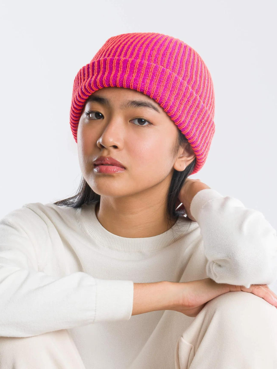 Model wearing a hat