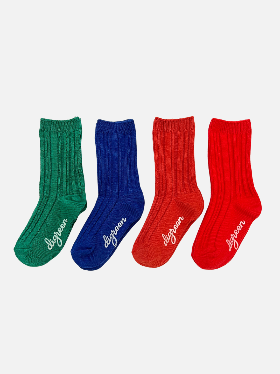 A set of four pairs of Pigment socks for kids. Green, Blue, Orange Red and Classic Red. with a digreen cursive logo on the bottom of the sock. 