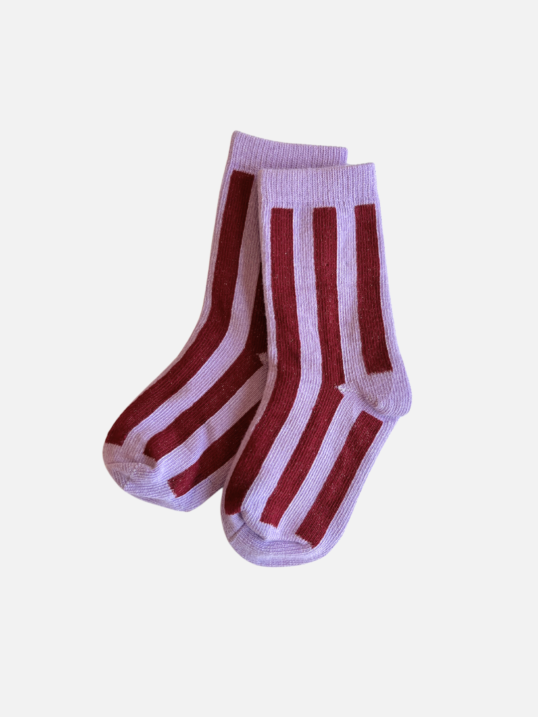 Violet | Introducing the STRIPE SOCK: A pair of light violet, stretchy cotton socks featuring dark red vertical stripes for that comfy, stripy look.