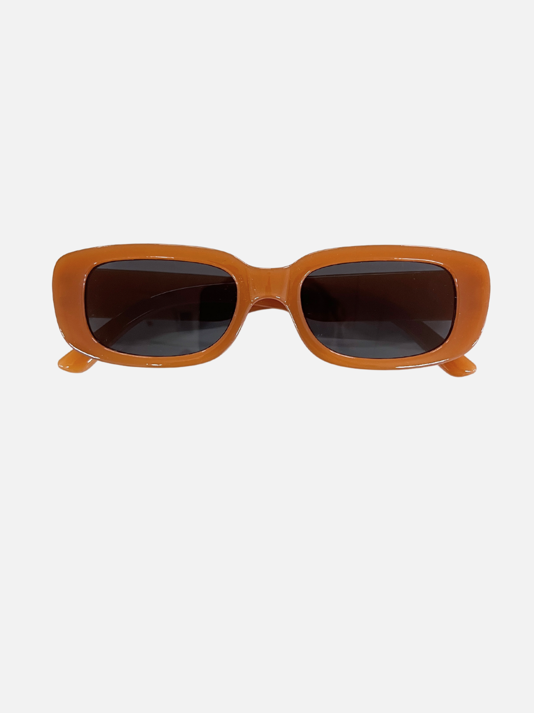 Terracotta | SANTA CRUZ SUNGLASSES in terracotta, with UV400 protection, are shown on a white backdrop, ideal for kids aged 2-6.