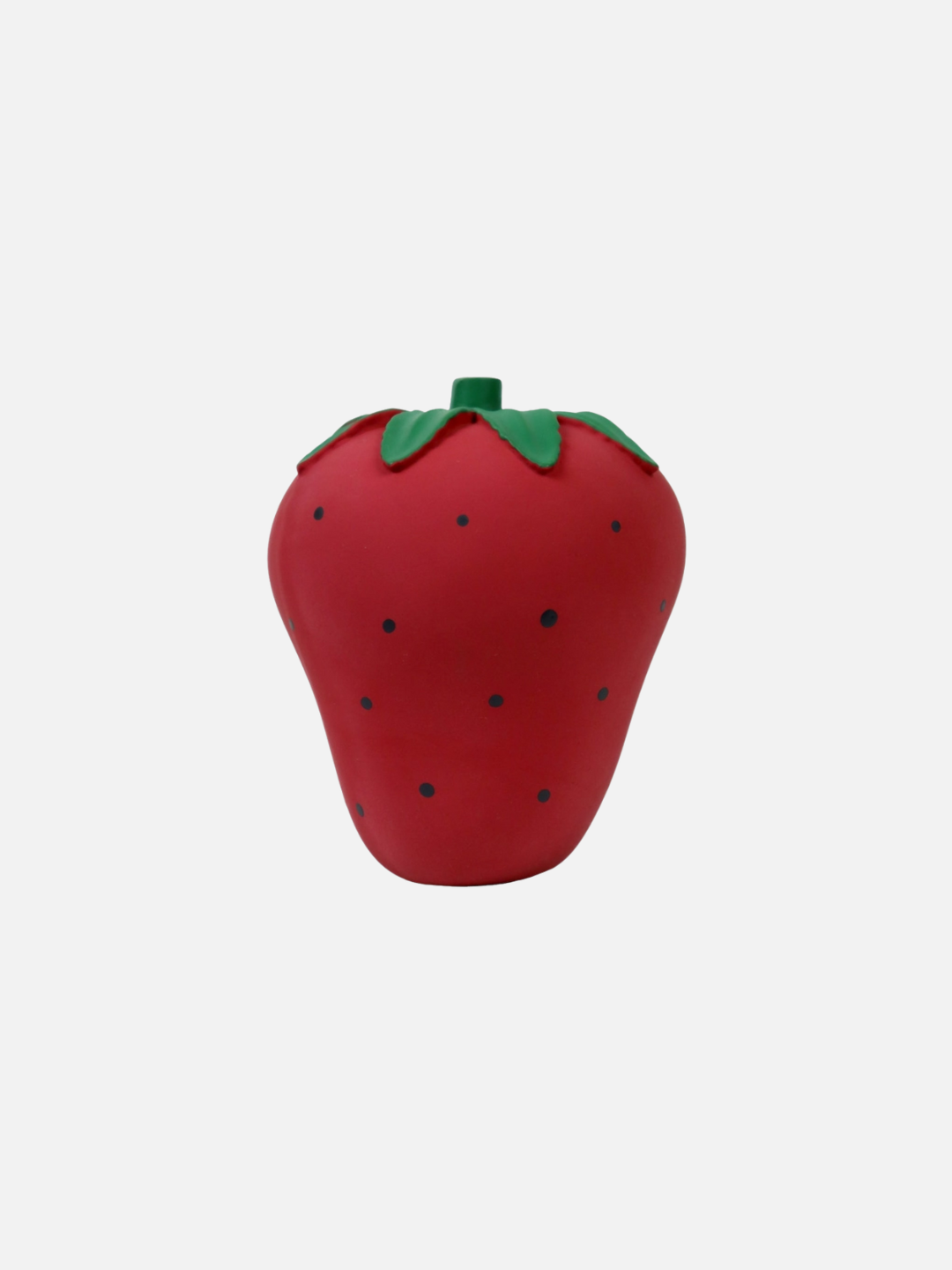 STRAWBERRY | Introducing the BERRY RATTLE TEETHER: a strawberry-colored sensory toy featuring small black dots and green leaves on top, set against a white background. Made from handmade natural rubber, it's perfect for soothing those sore gums.