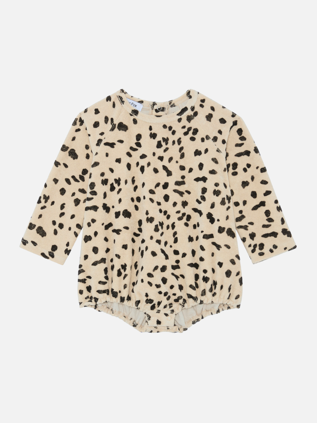 Discover our new arrivals: the DALMATIAN TERRY BODYSUIT, a beige long-sleeve baby onesie with a black spotted pattern, resembling animal print. Shop all clothing to find more adorable outfits for your little one.