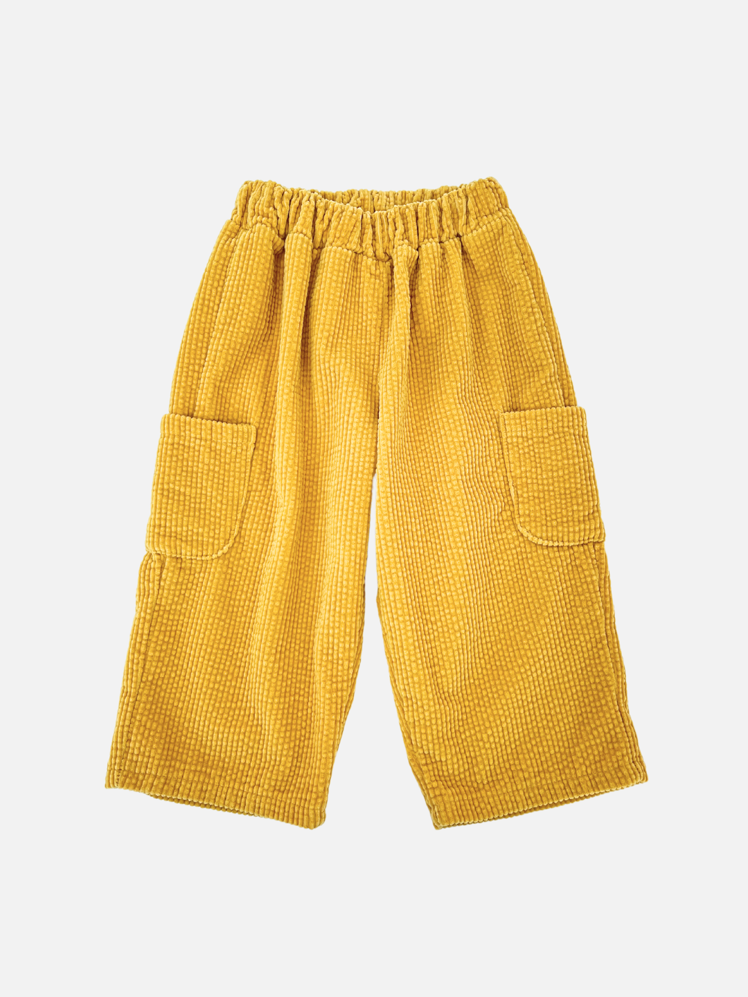 Gold | The CORD POCKET PANT, in a gold hue, features large side pockets and an elastic waistband, inspired by a trendy Korean kids brand.