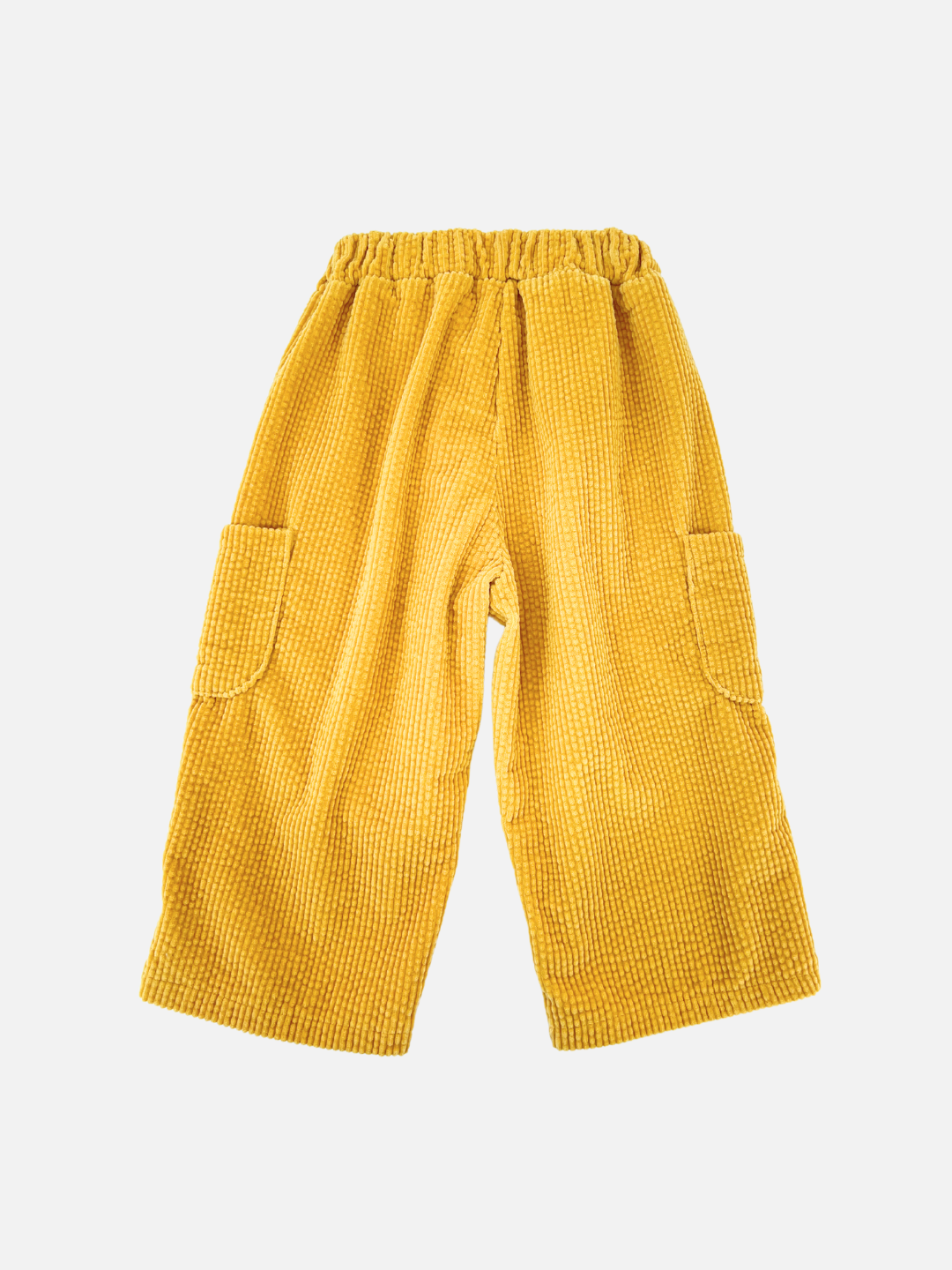 Gold | The CORD POCKET PANT, designed by a reputable Korean kids brand, is showcased against a crisp white background. These yellow checkered pants come with an elastic waistband and handy side pockets, ideal for playful days.