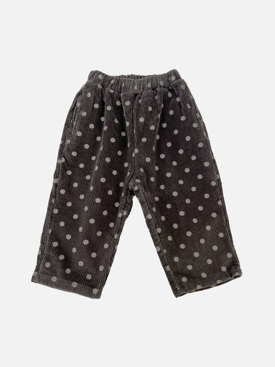 Charcoal | The FLEECE-LINED DOT CORDS in charcoal, featuring a polka dot pattern and laid flat against a white background, highlight the stylish charm of a Korean kids brand.