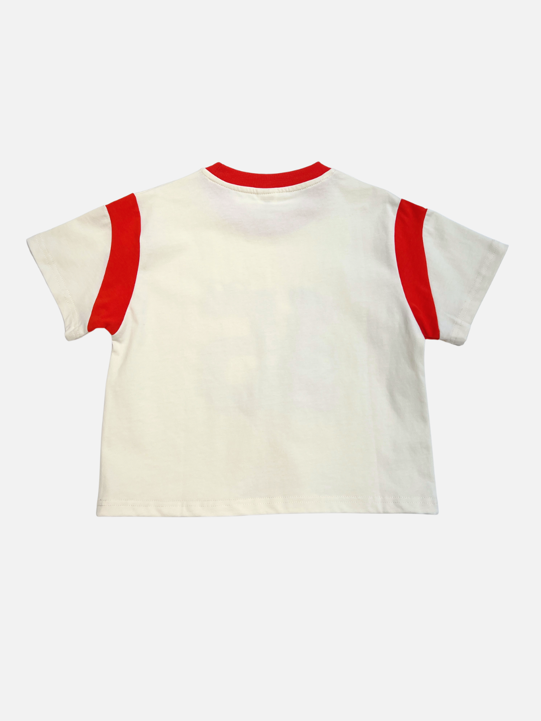 The VARSITY TEE is a white, short-sleeve cotton t-shirt with an oversized boxy fit, red collar, and red shoulder accents, shown with the back side facing up.