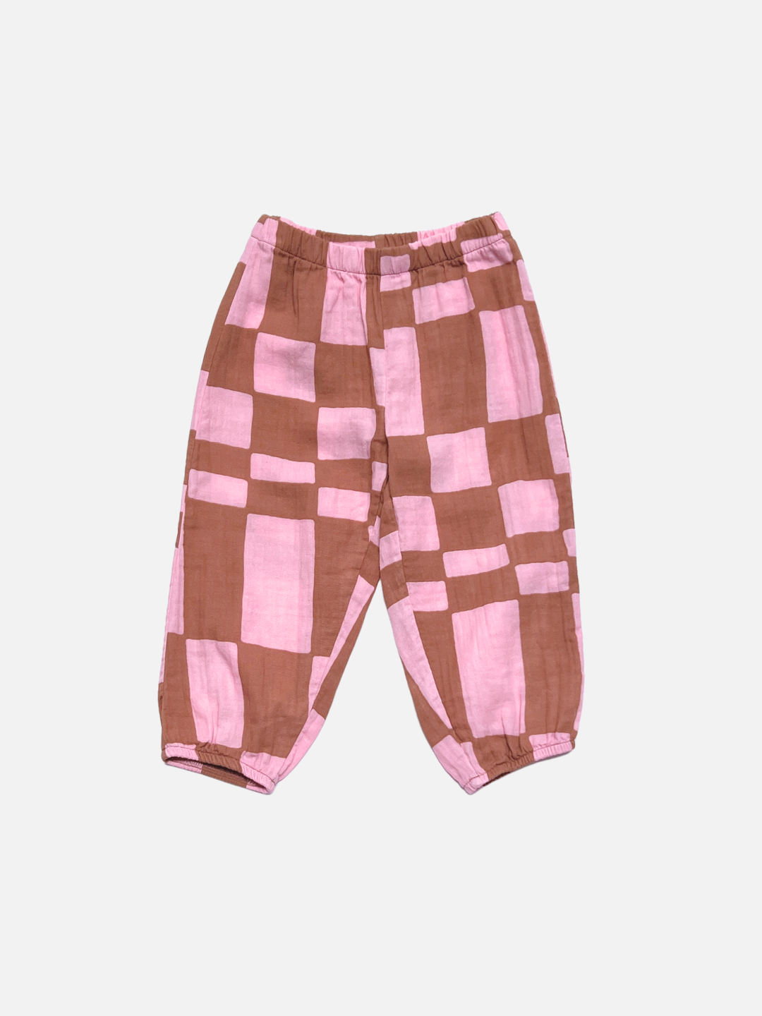 The MUSLIN PULL ON PANT is a pair of toddler jogger pants with an elastic waistband and ankle cuffs, featuring a Pink Checkers pattern.