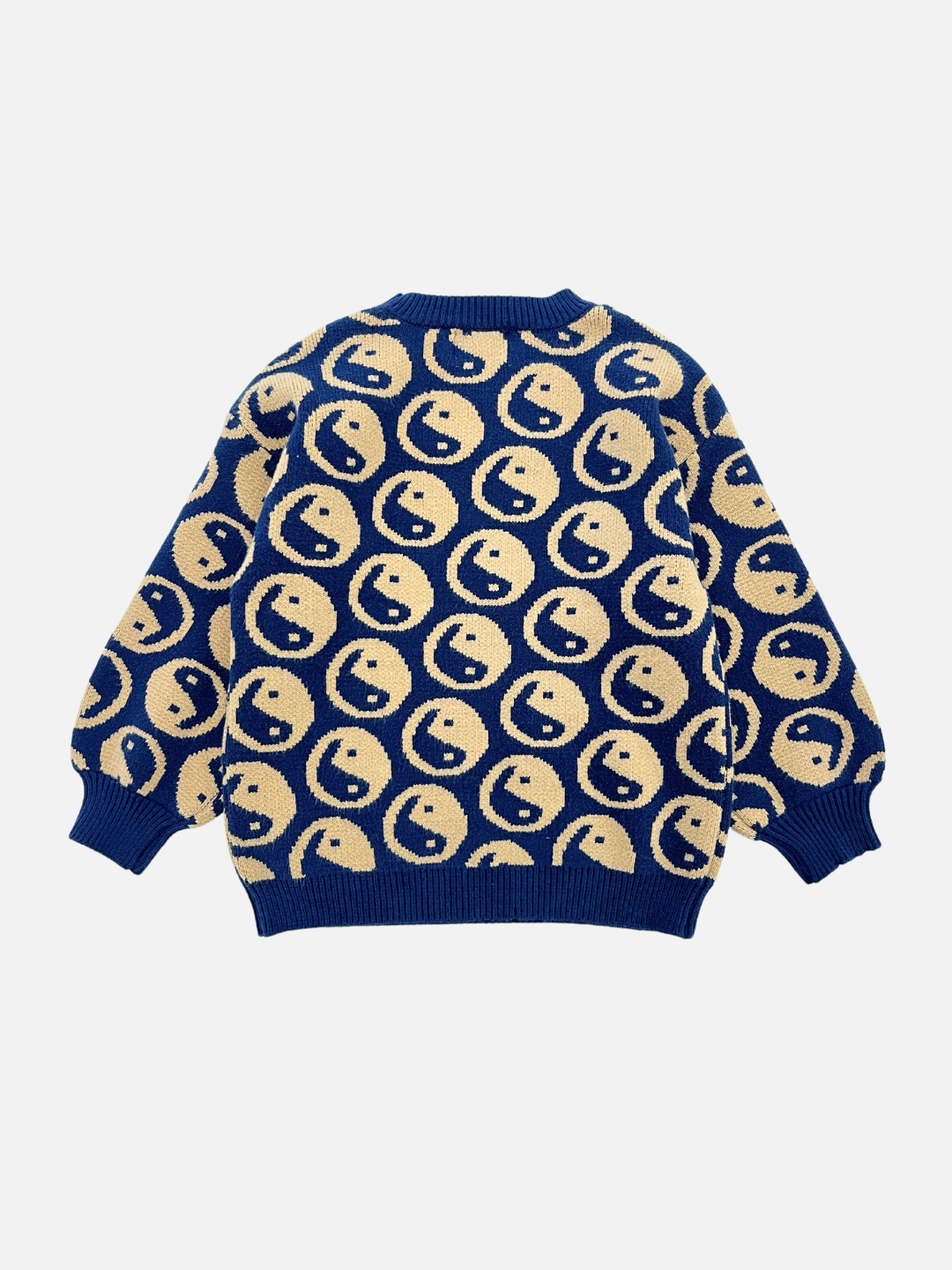 Navy | The COSMOS SWEATER is a super-soft crewneck available in blue and beige. It features an intarsia knit pattern with repeated yin yangs, along with long sleeves, and ribbed cuffs and hem.