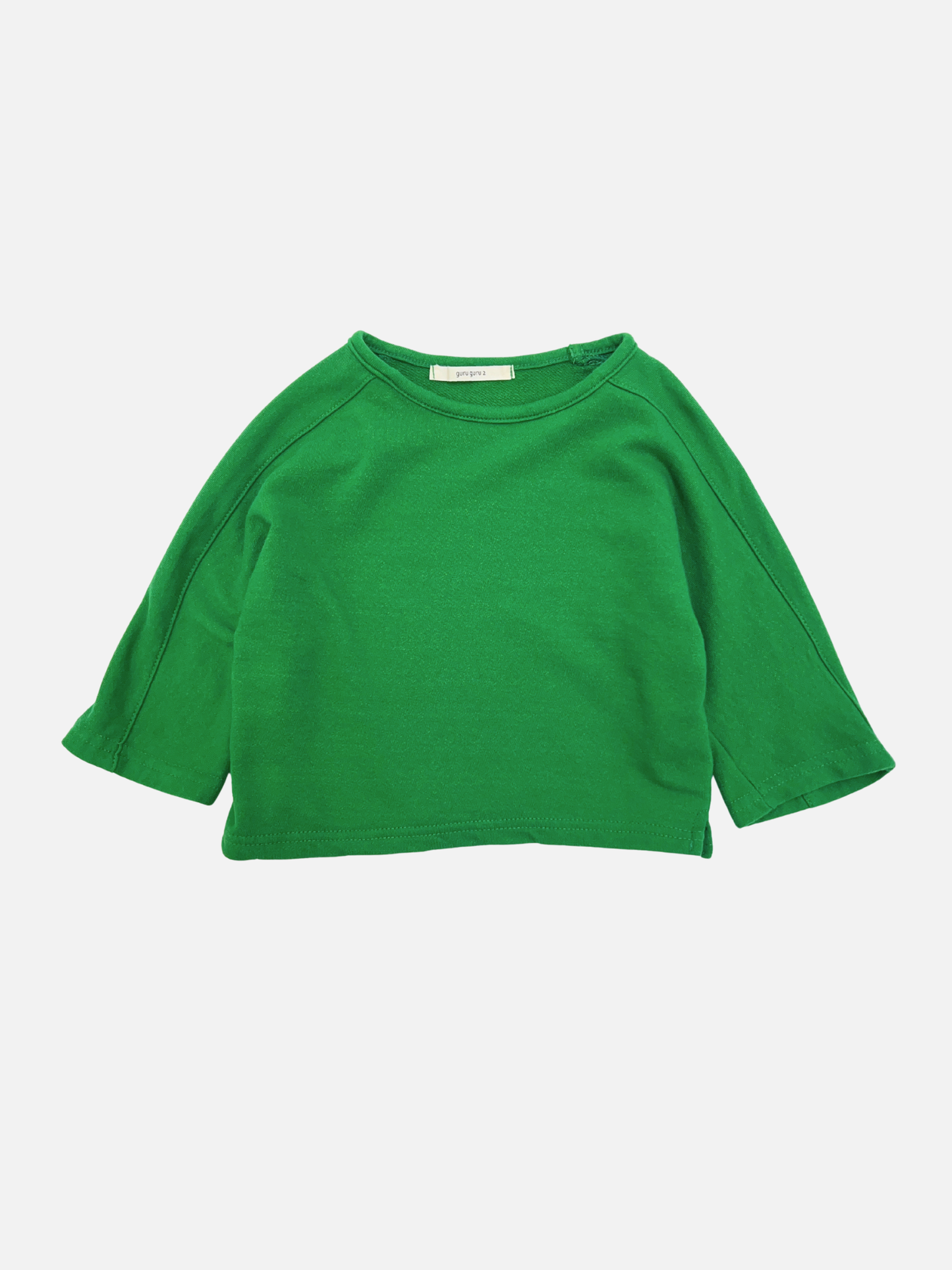 Green | The BABY BOATNECK LONGSLEEVE is a soft terry cotton green baby top with long sleeves and a boatneck, shown laid flat on white—ideal for fans of quality Korean baby brands.