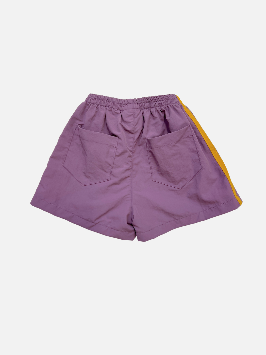SPRINTER SHORTS in purple with an elasticated waist, two back pockets, and a yellow side stripe are displayed on a plain white background.