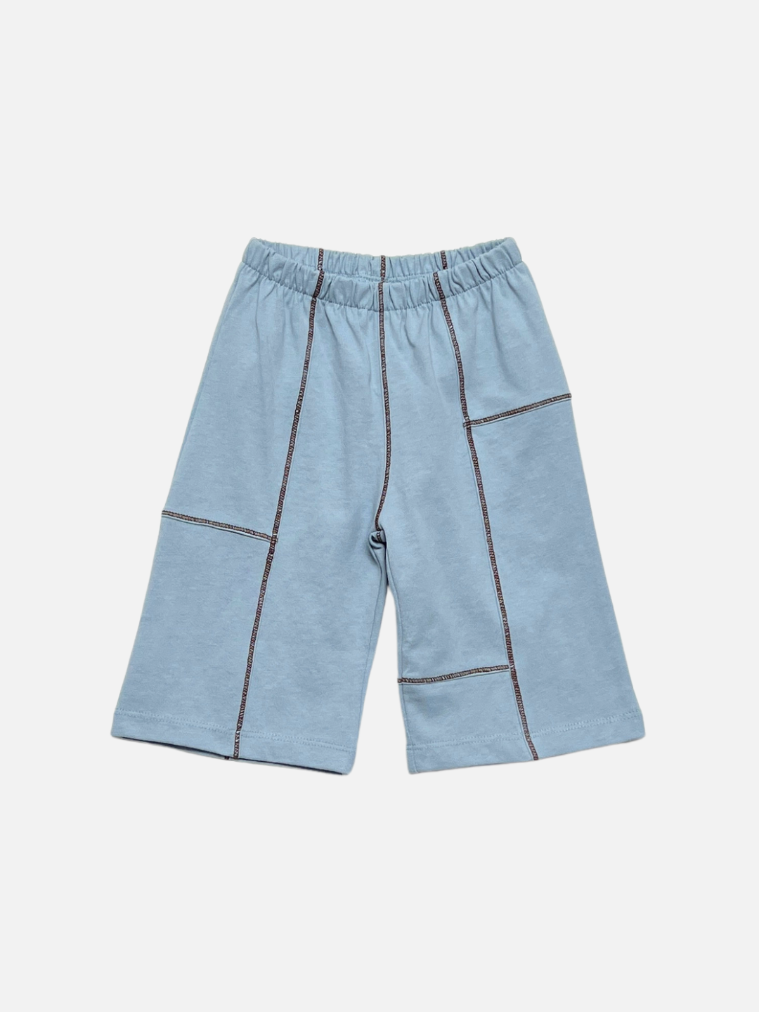 Light Blue | The TOPSTITCH BABY PANT in light blue is displayed flat on a white background, showcasing dark contrast stitching, an elastic waistband, and wide legs. These pull-on pants are designed for easy dressing and comfortable wear.