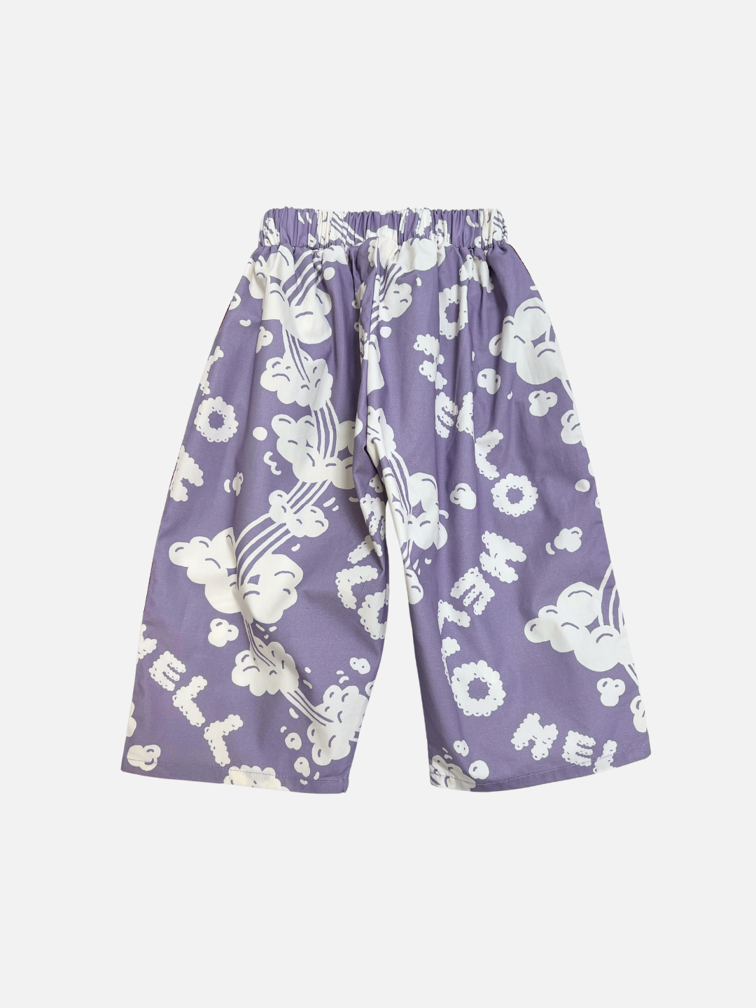 The SKYWRITING PANT is a wide-leg lavender pant with an elastic waistband, decorated with white cloud graphics and "GO 2 HELL" text.