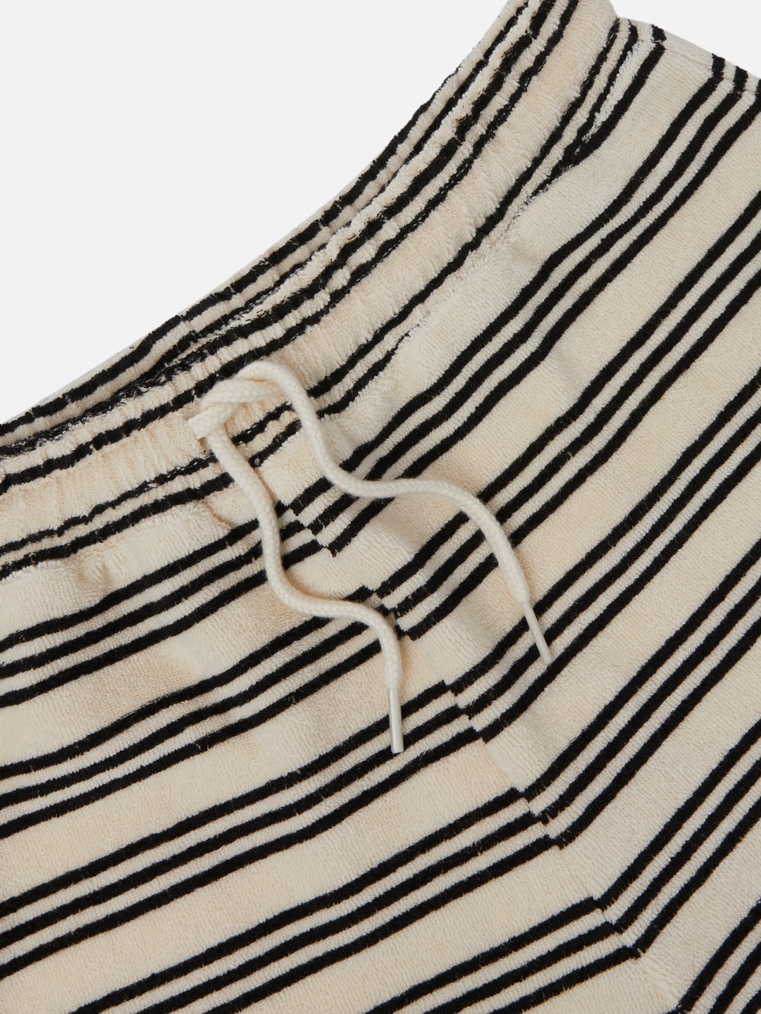 Stripe | A close up on the adjustable waist tie