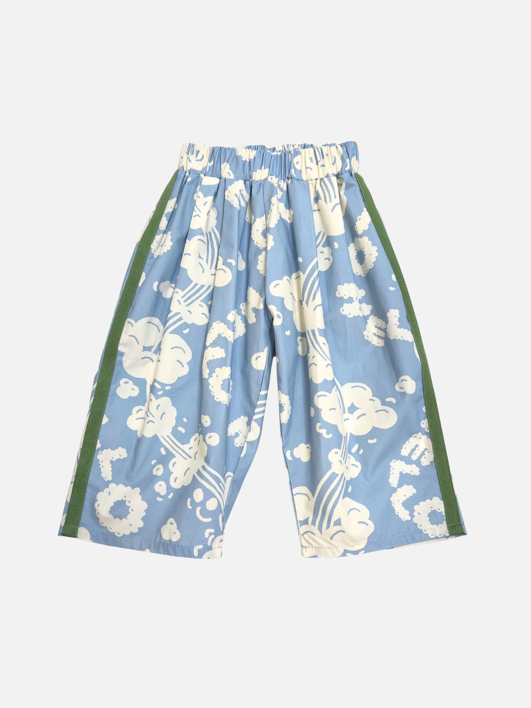 The SKYWRITING PANT features light blue wide-leg design with white cloud-like patterns, green side stripes, and an elastic waistband, shown on a plain background.