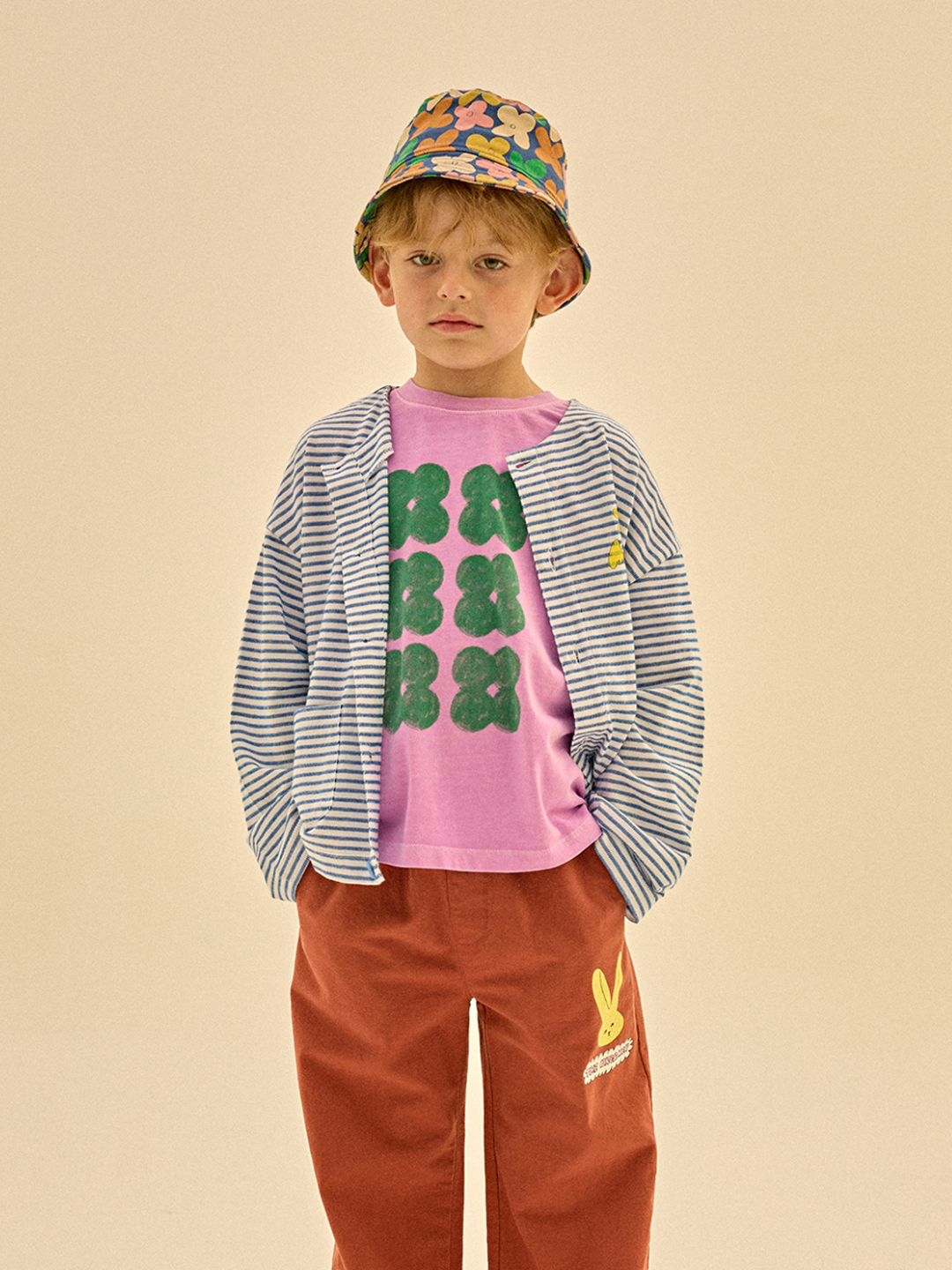 Child wearing Clover Tshirt styled.