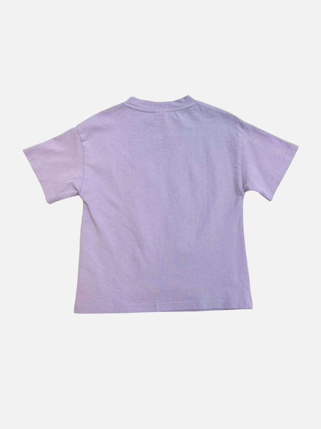 Lavender | The ANIMALS TEE, a plain, light purple oversized kids' t-shirt with short sleeves, is displayed from the back against a white background.