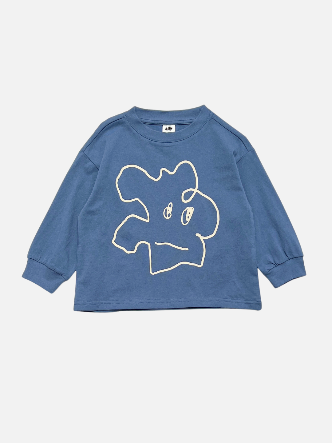 Blue | The SQUIGGLE LONGSLEEVE is a blue relaxed-fit longsleeve tee crafted from 100% cotton, featuring a simple white abstract outline graphic of a face on the front, reminiscent of a doodle character, and displayed against a plain background.