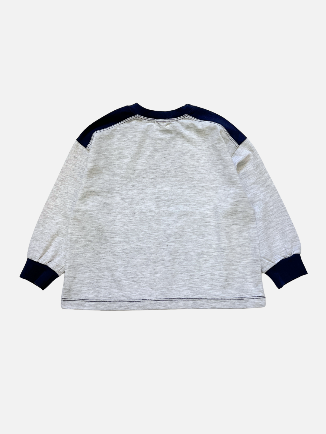 Navy/Light Heather | The MEMORY LANE LONGSLEEVE, a cotton light gray tee with navy cuffs, collar, and shoulder panels in vintage sports jersey style from a popular Korean kids brand, is shown laid flat with the back facing up.