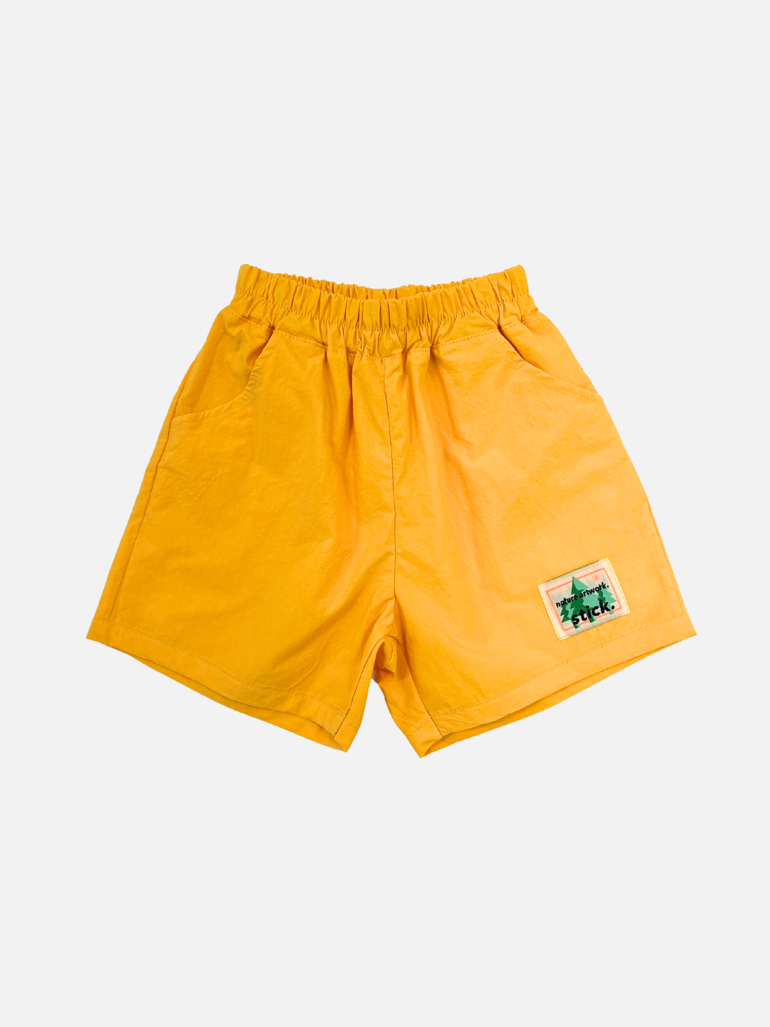 Mango | Orange kids' shorts front view.