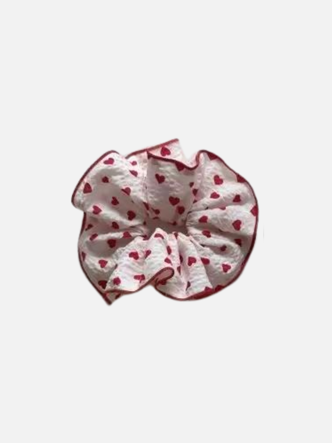 Red | White hair scrunchie printed with small red hearts with red trim around edge.